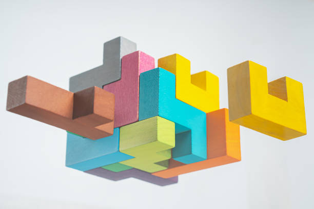 istock Abstract construction from wooden blocks. The concept of logical thinking. 1367709325