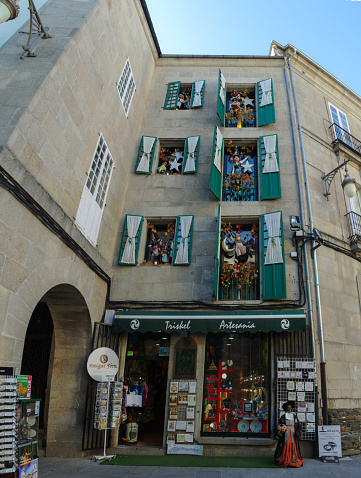 2018 June 18. Spain. Lugo. Originally decorated souvenir shop, with the traditional character of the city of Lugo - a witch.