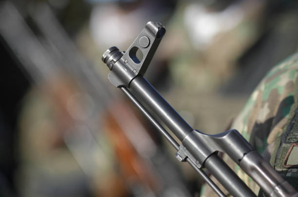 istock Details with Romanian soldiers holding AK 47 automatic rifles during a public ceremony. 1367713528