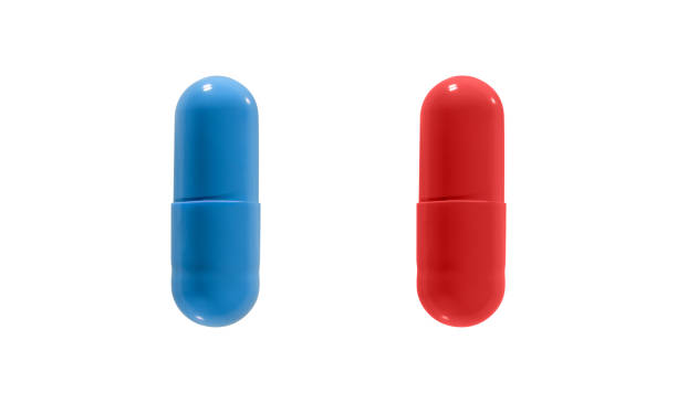 nahaufnahme von roten und blauen pillen isoliert auf weißem hintergrund. clipping-pfad. - antibiotic red medicine healthcare and medicine stock-fotos und bilder