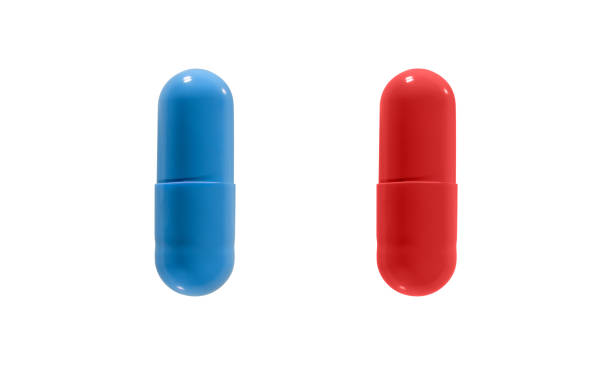 白い背景に隔離赤と青の丸薬のクローズアップ.クリッピングパ��ス。 - vitamin pill red pill capsule ストックフォトと画像