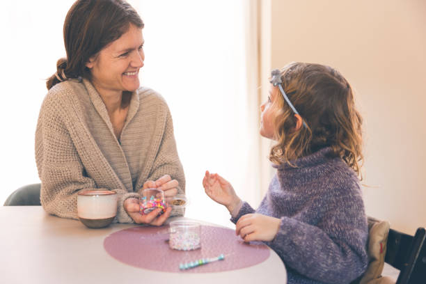 istock Mother and daughter creative together 1367717099
