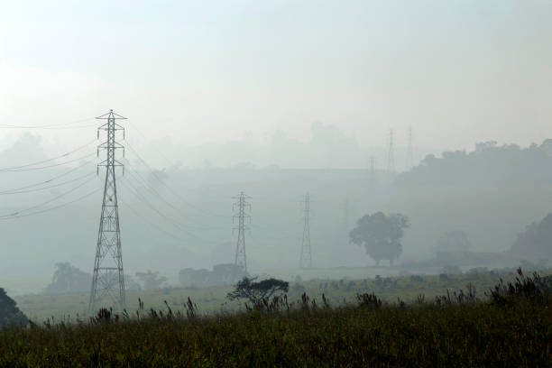istock Electric power towers, under mist 1367718097