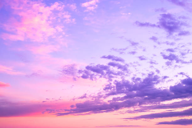 istock Very peri ,Pink, purple sky,Evening Dusk cloud on Sunset, idyllic nature cloud. dramatic sunlight with majestic peaceful sky in summer season. Pastel colors. Abstract nature background.trendy color 1367718123