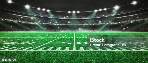 Green Field In American Football Stadium Ready For Game In The Midfield Stock Photo - Download Image Now