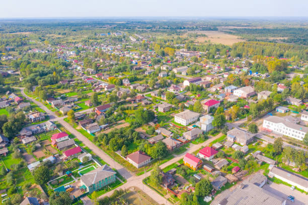 istock Flying over small provincial town, aerial view. 1367721894