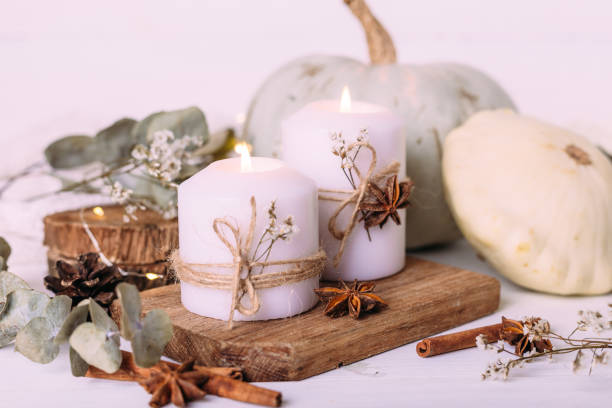 istock Autumn composition with pumpkin and candles. Beautiful autumn decor. 1367721940