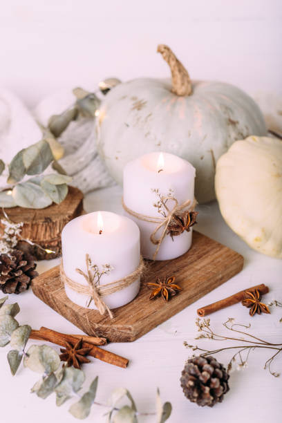 istock Autumn composition with pumpkin and candles. Beautiful autumn decor. 1367721975