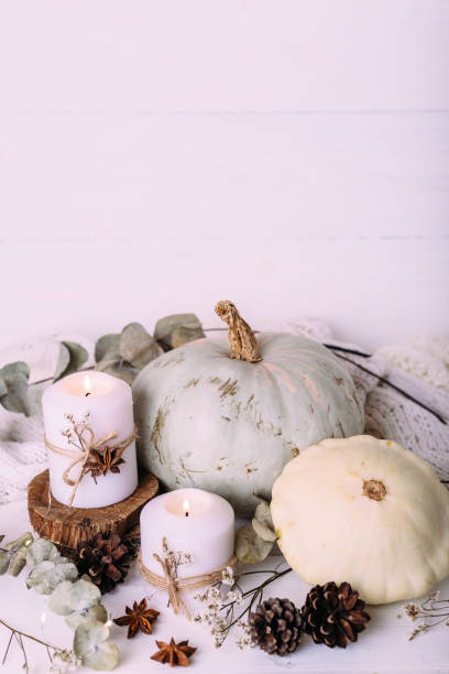 istock Autumn composition with pumpkin and candles. Beautiful autumn decor. 1367722250