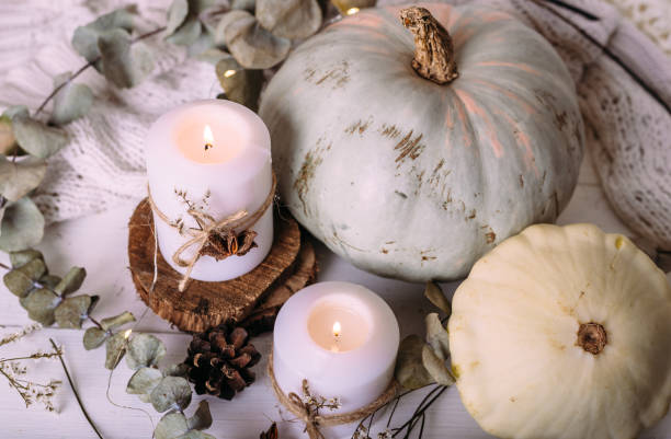 istock Autumn composition with pumpkin and candles. Beautiful autumn decor. 1367722284