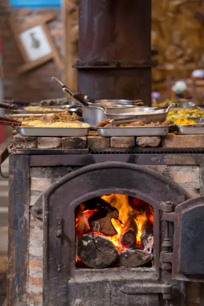 Photo of Wood burning stove with pans