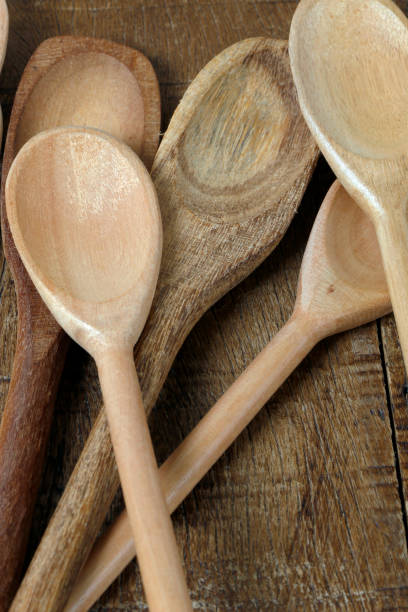 istock Wooden spoons on rustic wooden table 1367731581