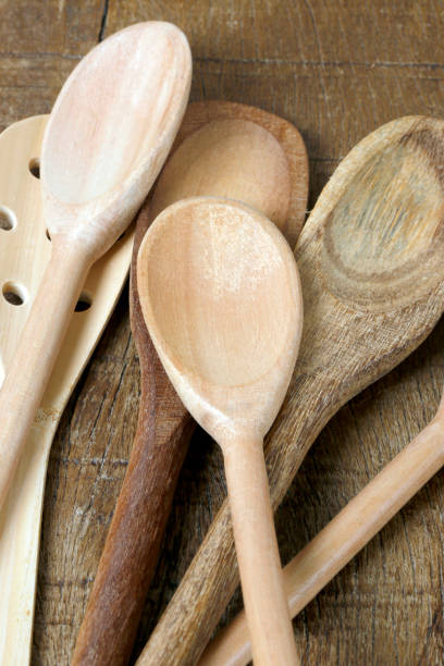 istock Wooden spoons on rustic wooden table 1367731592