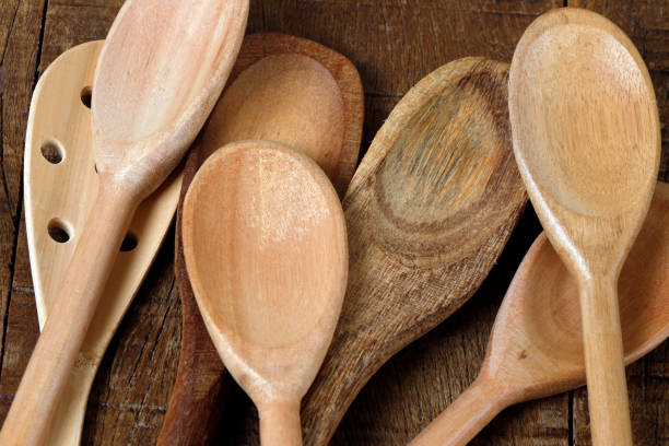 istock Wooden spoons on rustic wooden table 1367731602