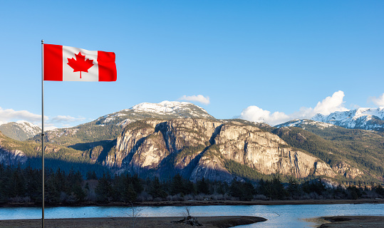 Famous Chief Mountain during sunny winter sunset. Canadian National Flag Composite. Located in Squamish, North of Vancouver, British Columbia, Canada. Nature Background