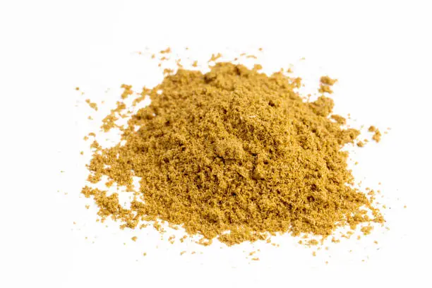 Photo of Cumin spice on a white background