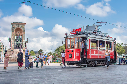 Istanbul, Turkey - September 10, 2019: Nostalgic tram moving on the Istiklal street.