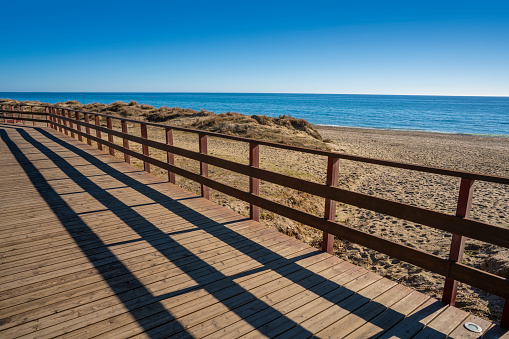 Marbella beach Playa del Pinillo beach Senda litoral wooden wakway in Costa del sol of Malaga in Andalusia of Spain