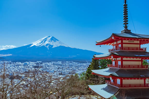 Mt. Fuji and Pagoda in the winter. January 21, 2020 is a cold winter day. We toured the city of Fuji under Mt. Fuji, encountered good weather, and took this photo of Mt. Fuji with the pagoda, which can see the whole city under Mt. Fuji. fujikawaguchiko stock pictures, royalty-free photos & images