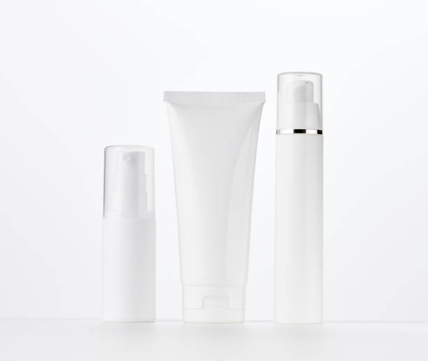 istock bottle, empty white plastic tubes for cosmetics. Packaging for cream, gel, serum, advertising and product promotion 1367738733