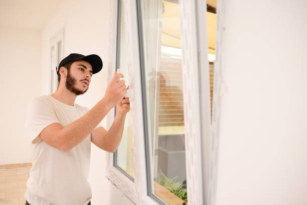 istock handsome young professional man installing and replacing a new home windows in client house for improvement energy saving efficiency isolation 1367742795