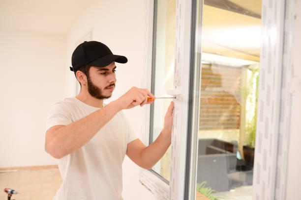 istock handsome young professional man installing and replacing a new home windows in client house for improvement energy saving efficiency isolation 1367742807