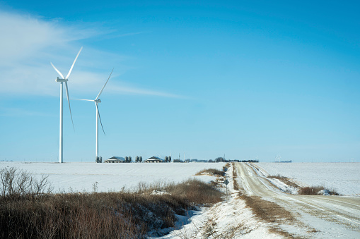 Windfarm on a cold snowy day, Iowa, Minnesota, USA