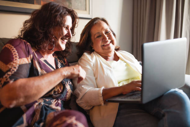 istock old friends having fun at home 1367756021