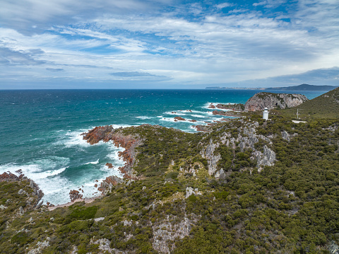Beautiful high angle aerial drone view of Rocky Cape Lighthouse, part of Rocky Cape National Park, located on the North-West Coast of the island of Tasmania, Australia.