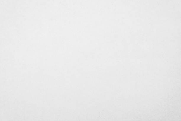 istock White recycled craft paper texture as background. Grey paper texture, Old vintage page or grunge vignette of old cardboard. Pattern rough art creased grunge letter. Hardboard with copy space for text. 1367760189