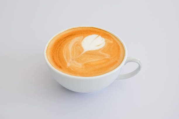 istock Cup hot latte with flower textured on white background. 1367762537