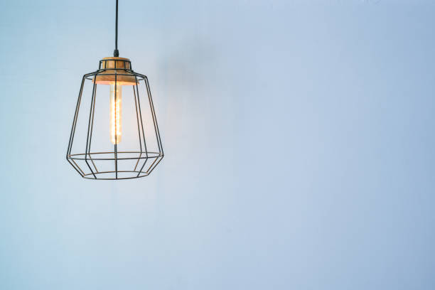 istock Vintage hang lamp against blue wall. 1367762720