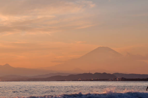 istock Silhouette  Mt. Fuji  on sunset beach 1367766863