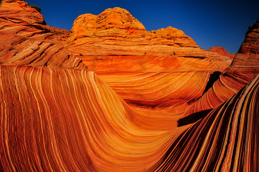Sunrise on The Wave sandstone formation, Coyote Buttes North, Vermilion Cliffs National Monument, Arizona, USA