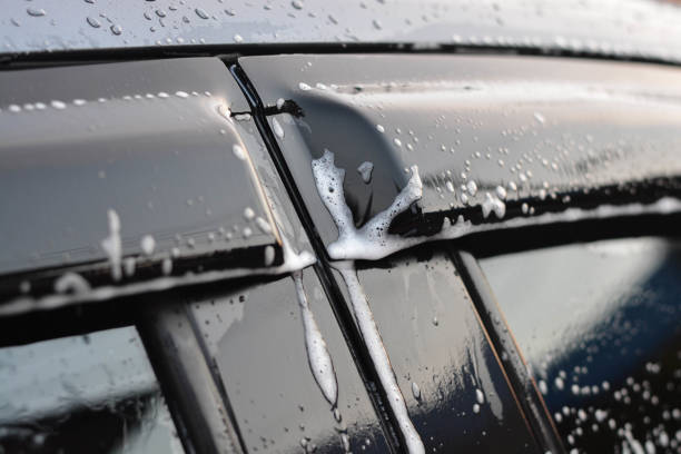 istock All bubble flow down on the car mirror. Wash car. 1367771956