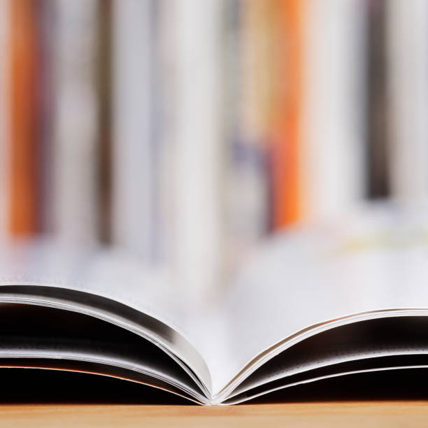 istock Close up of open magazine at the library 1367775802