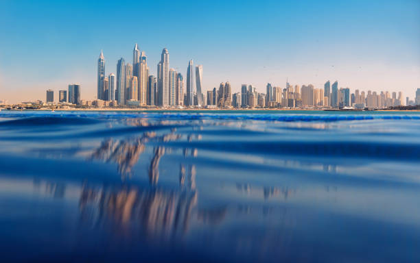istock Cityscape of modern Dubai Marina with reflection in water. 1367781833
