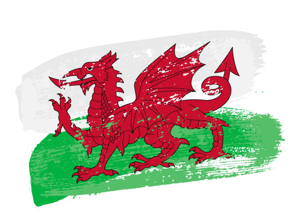 Wales official flag on brush paint stroke, abstract texture of national country emblem Wales official flag on brush paint stroke vector illustration. Abstract texture of national country emblem with Welsh red dragon, grunge label, sketch element design isolated on white background welsh flag stock illustrations