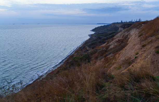 istock sunset seascape, sea, waves, view from high hills 1367783633