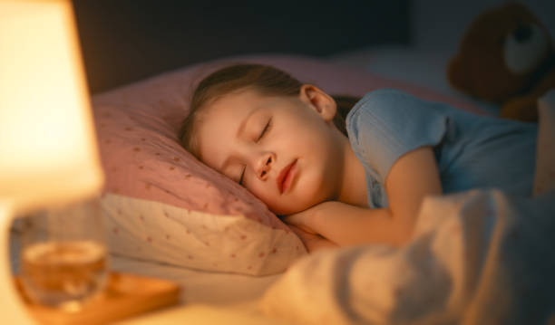 istock child is sleeping in the bed 1367785478