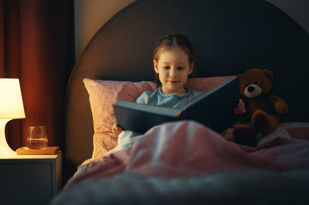 istock girl is reading a book 1367785481