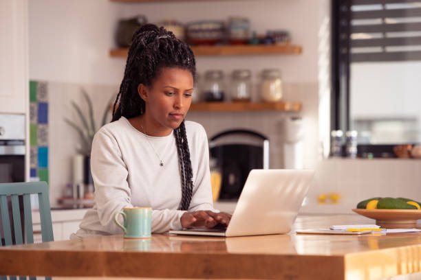 istock Freelancer woman working online at home. 1367785659