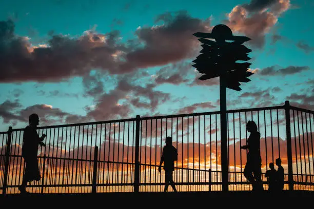 Photo of Silhouette of people at lookout