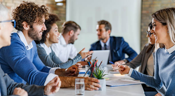 istock Panoramic view of business meeting in progress. 1367786772