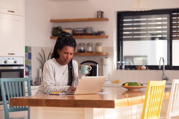 istock Freelancer woman working online at home. 1367787654