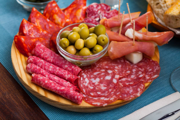 istock Meat platter on wooden plate 1367788973