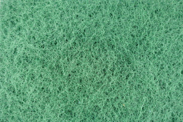 istock Green color cleaning sponge texture. 1367791717