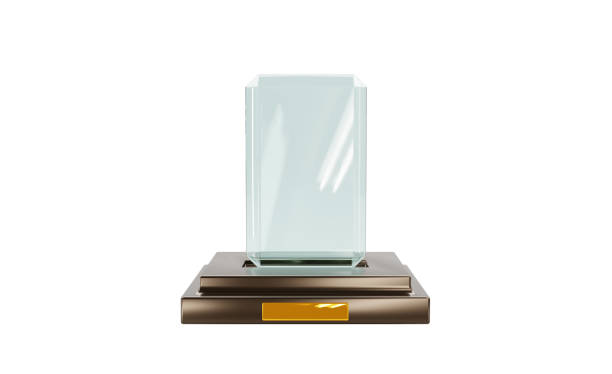 istock 3d render, glass award trophy or winner prize on wooden pedestal, front view. Mockup empty crystal plate or clear rectangular acrylic frame isolated on white background. Realistic illustration 1367794163