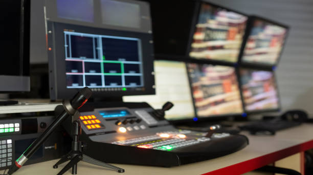 istock Television director's office with remote control and microphone, monitors, sensors, copy space 1367797678
