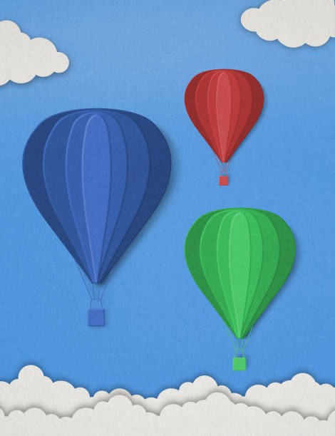 istock Paper hot air balloons and clouds 1367797826